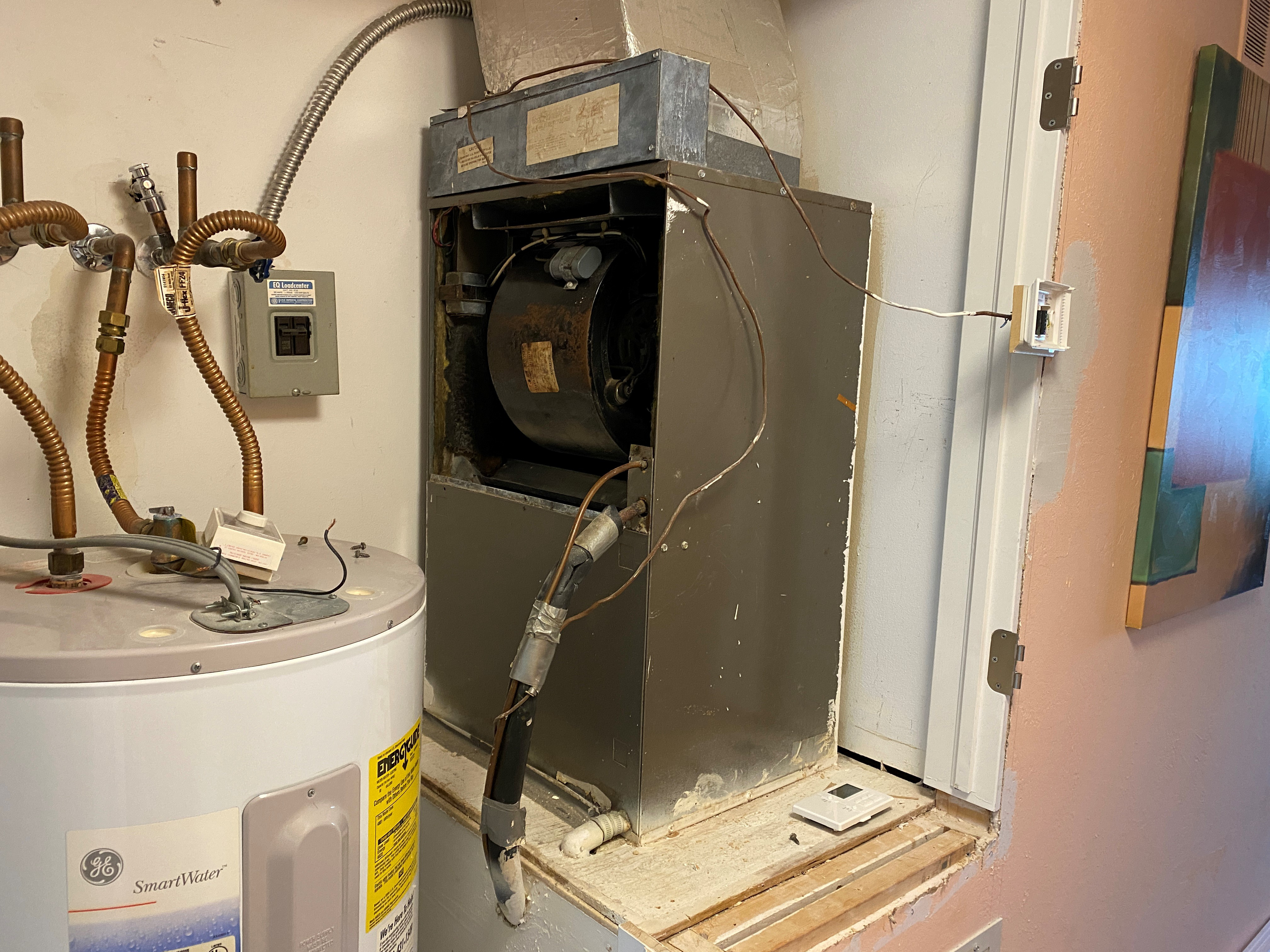 Old worn air handler in Southwest Florida showing the need for replacement