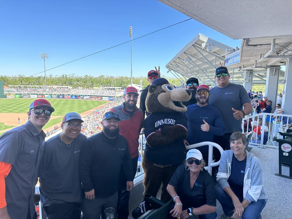 The HomePros Cooling & Heating team at a Minnesota Twins spring training game in Fort Myers
